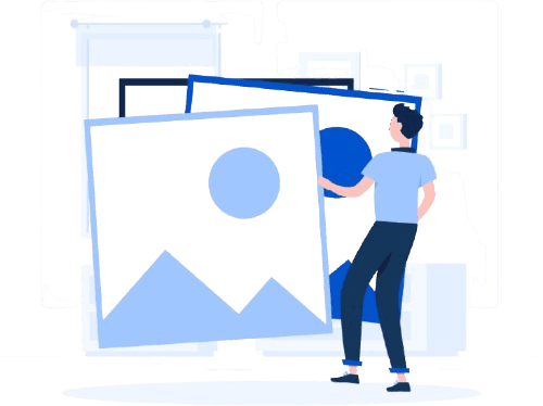 A person arranging large image frames